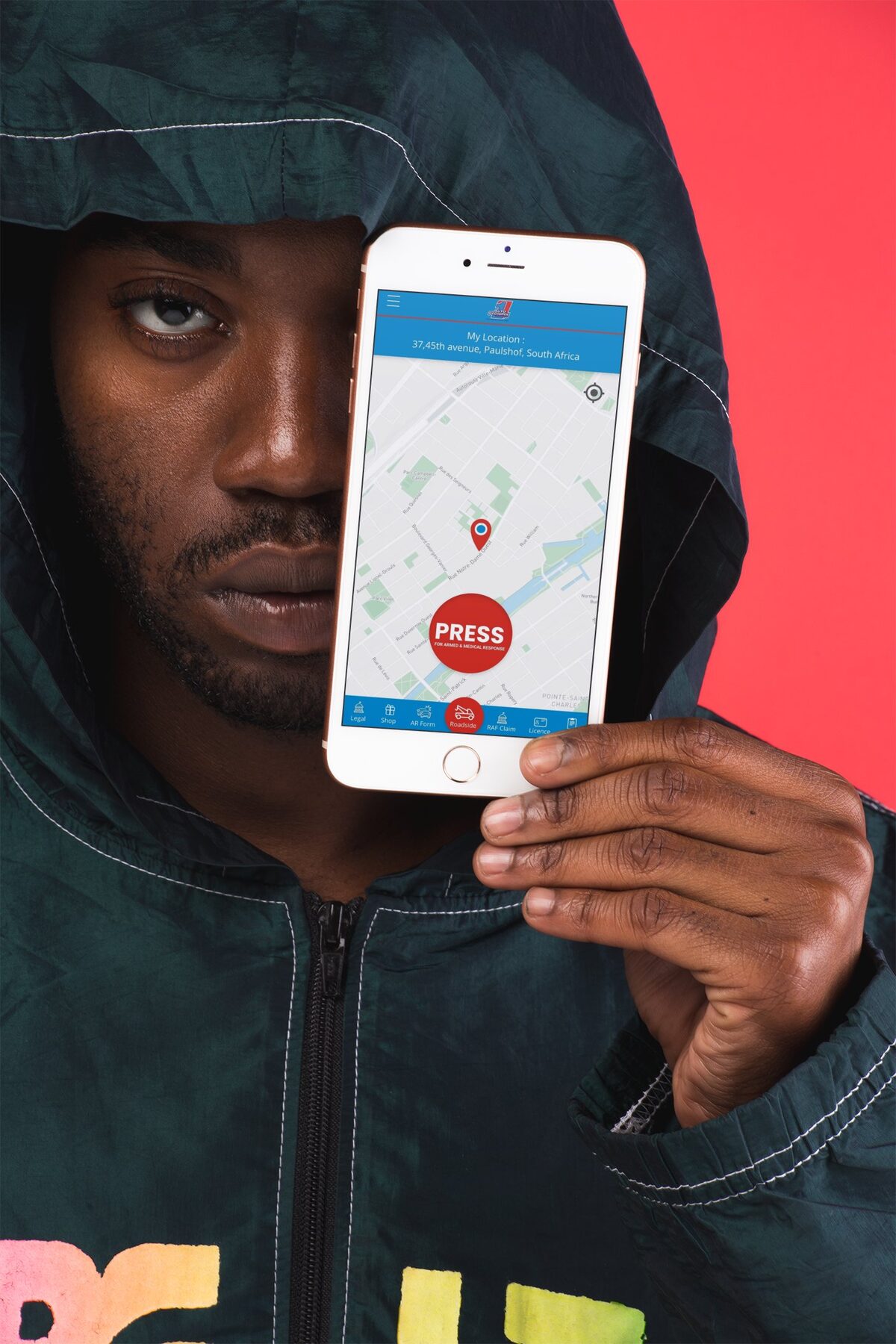 Young man holding the Premium Help app open on his phone